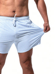 Manfinity Swimmode Men Vertical Striped Drawstring Waist Swim Trunks Blue and White